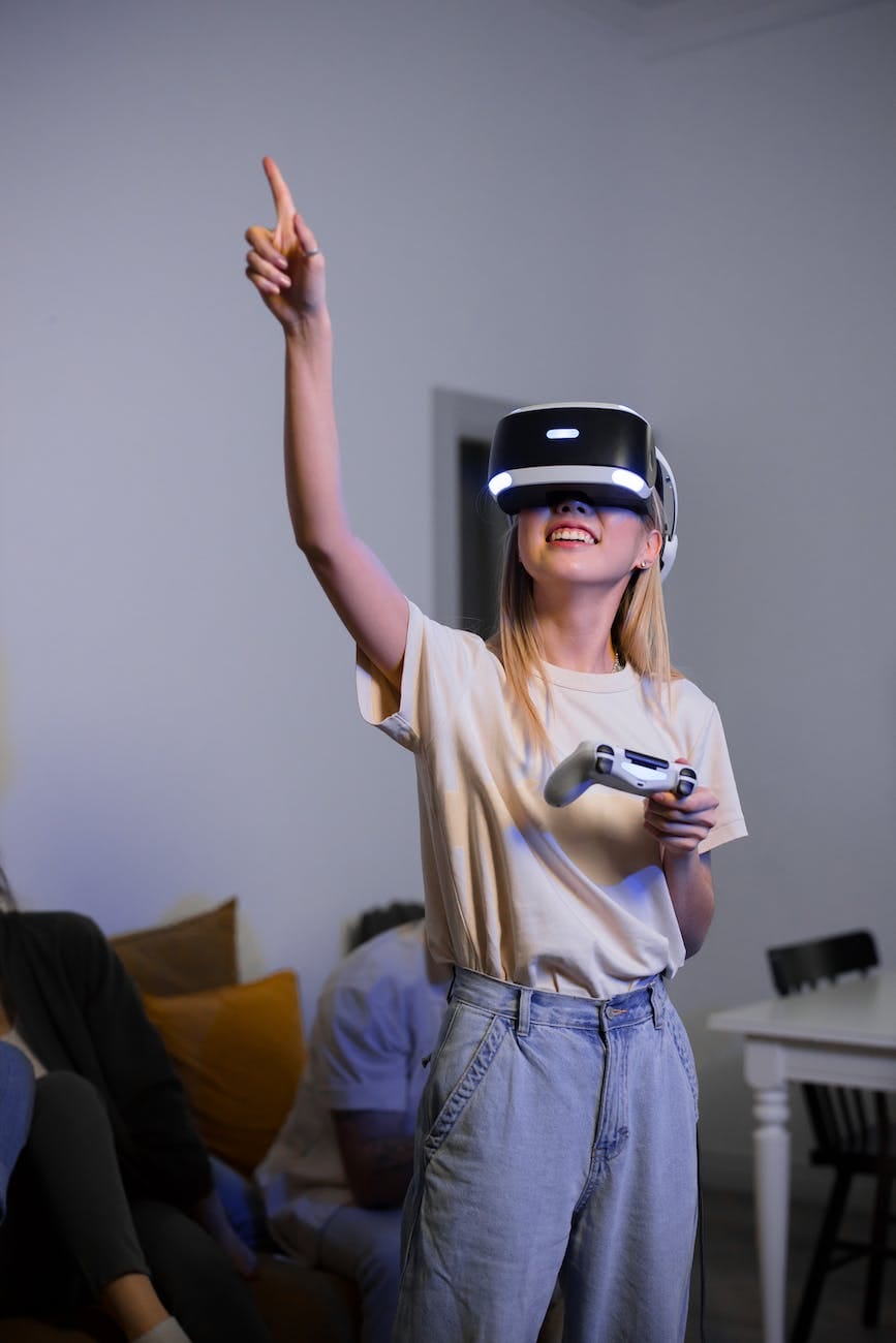 girl playing with virtual reality headset